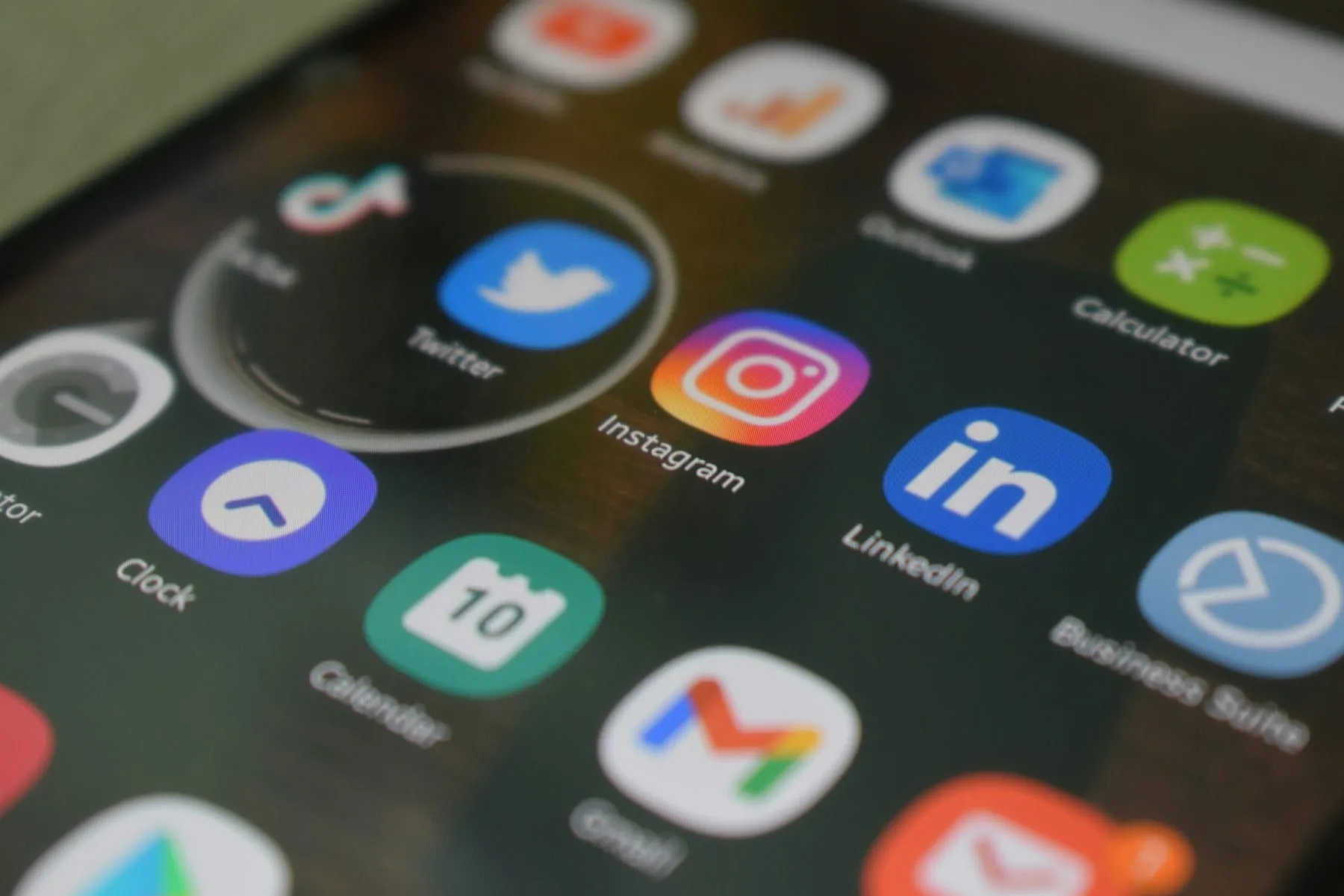 A close-up of a phone screen filled with social media icons